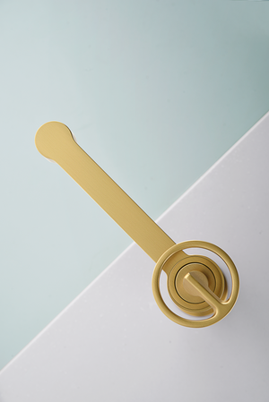 Olimpo Brushed Gold Single Lever Basin Faucet, in a bathroom setting
