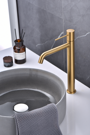 Genova Brushed Gold Tall Basin Faucet Single Lever, in a bathroom setting