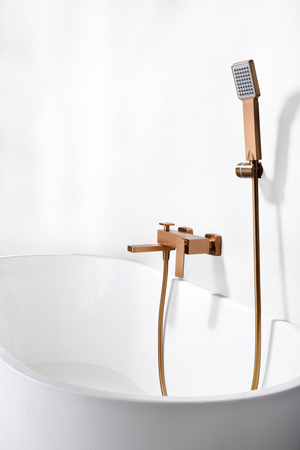 Pisa Brushed Rose Gold Single-Lever Shower Bath Kit, in a bathroom setting