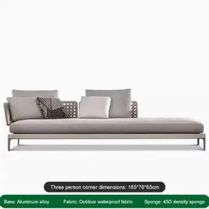 Close up of woven rattan texture and aluminum frame on modular outdoor sofa set cushioning detail