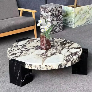 Round marble coffee table with Calacatta Viola top in modern style