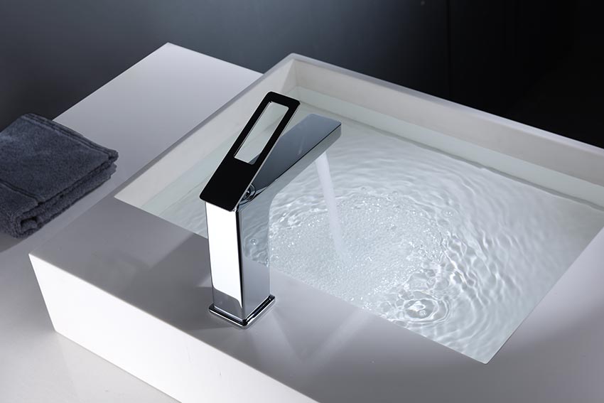Chrome Single Lever Basin Mixer Faucet Nordic Design, in a bathroom setting