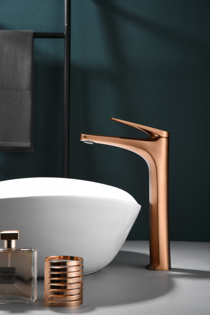 Delos Tall Basin Mixer Brushed Rose Gold Faucet, in a bathroom setting