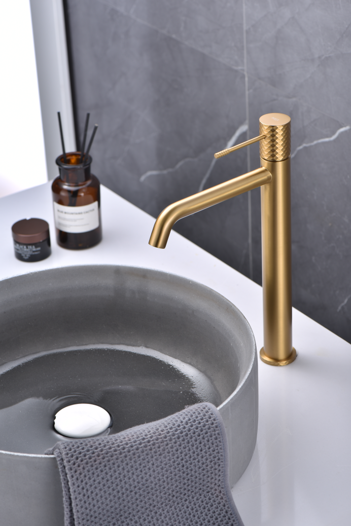Genova Brushed Gold Tall Basin Faucet Single Lever, in a bathroom setting