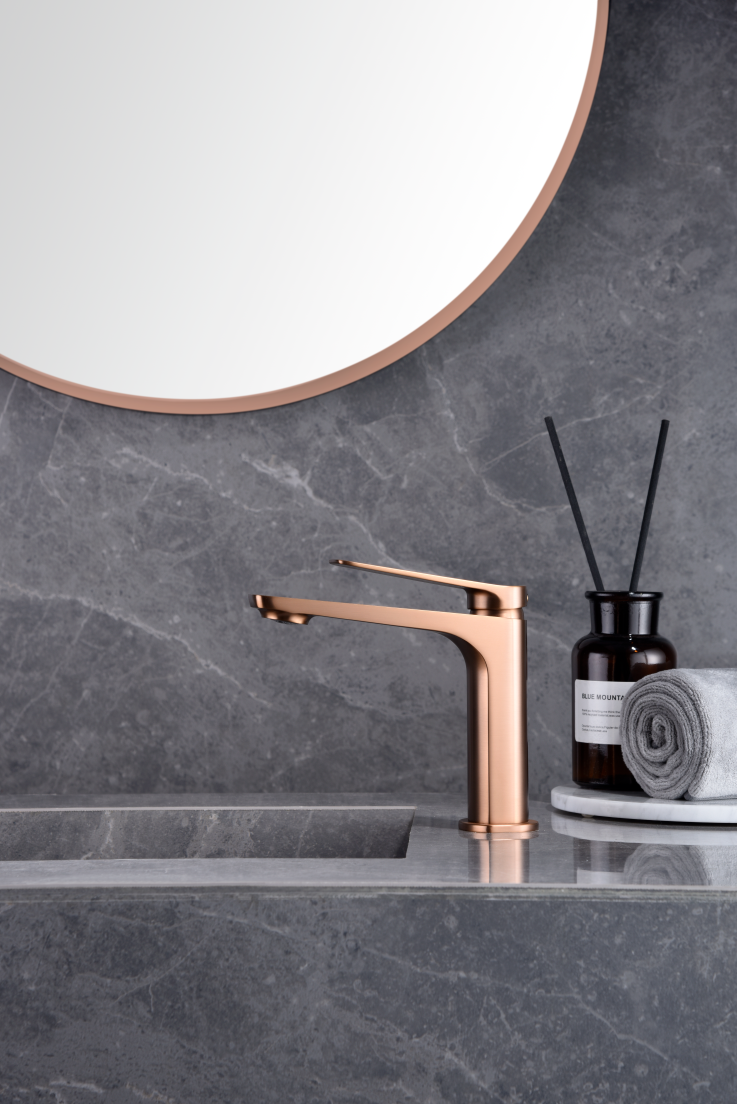 Brushed Rose Gold Single Lever Basin Mixer Faucet, in a bathroom setting