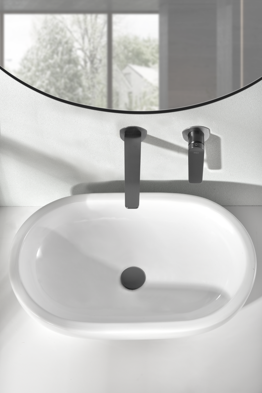 Black Gun Metal Single Handle Bathroom Sink Faucet, in a bathroom setting