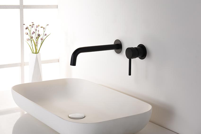 Matte Black Single Handle Bathroom Sink Faucet, in a bathroom setting