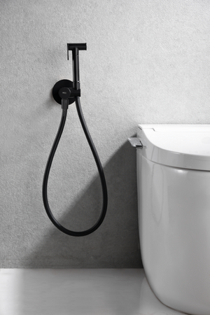 Matte Black Built-in Bidet Faucet Modern Design, in a bathroom setting