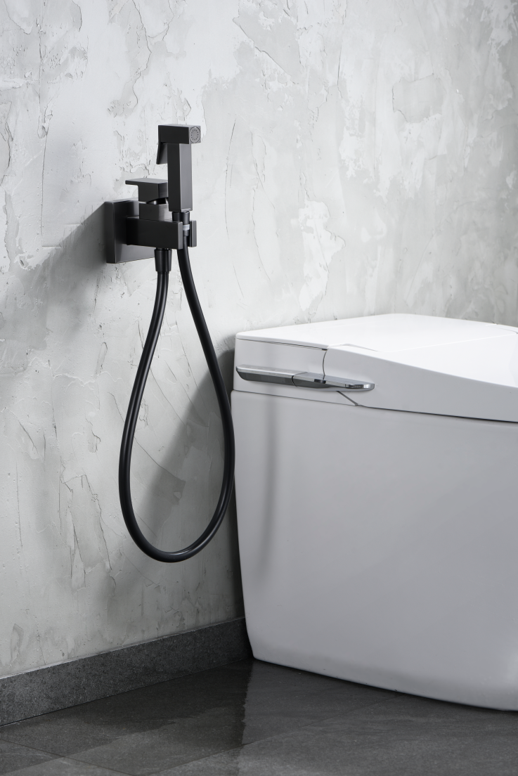 Gun Metal Built-In Bidet Faucet with Pop-Up Drain, in a bathroom setting