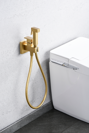Brushed Gold Built-In Bidet Faucet with Pop-Up Waste, in a bathroom setting