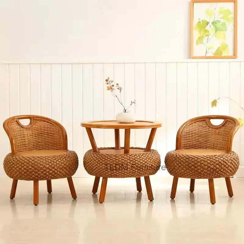 Bamboo rattan outdoor patio set showing natural woven material texture and craftsmanship detail on chair frame