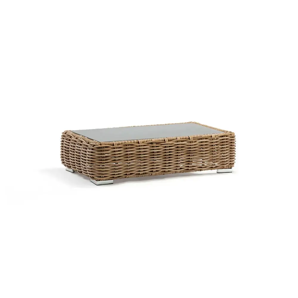 Close up of wicker rattan weave texture on outdoor patio sofa set with natural finish