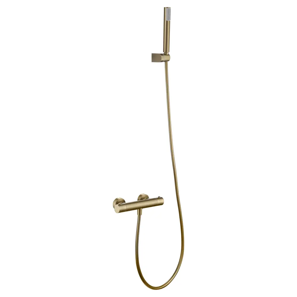 Brushed gold thermostatic shower set with modern chrome fixtures and sleek design