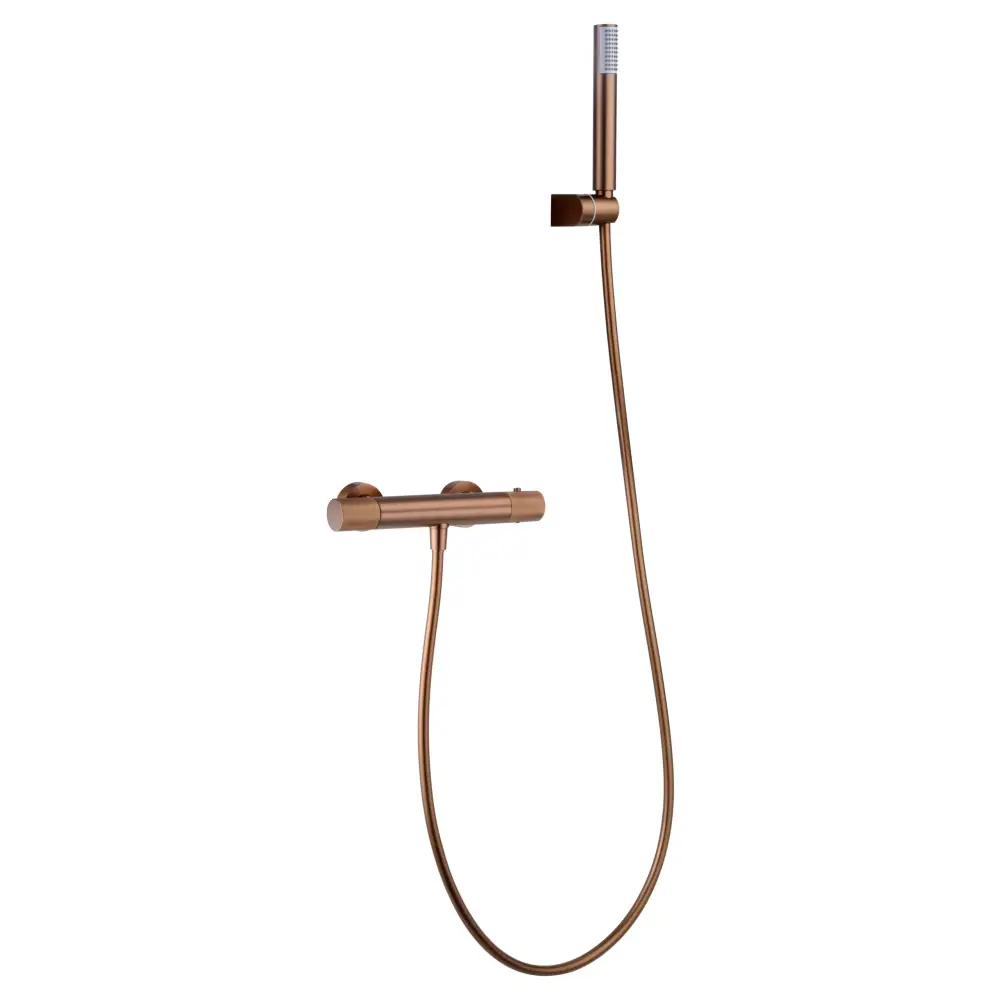 Brushed rose gold thermostatic shower set with modern fixtures and sleek design