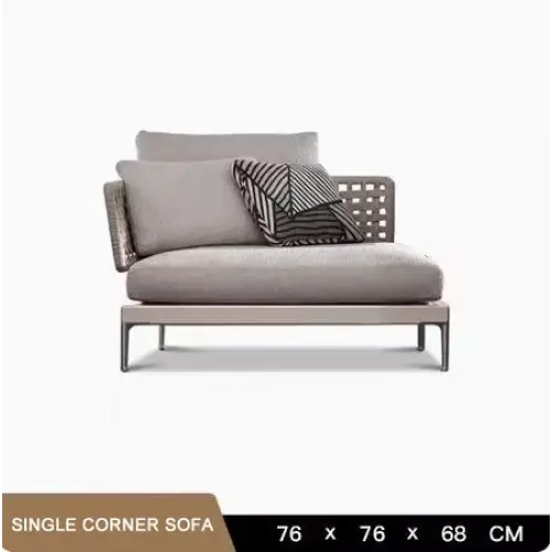 Modular L shaped outdoor rattan sofa set showing woven texture and cushion details in natural finish