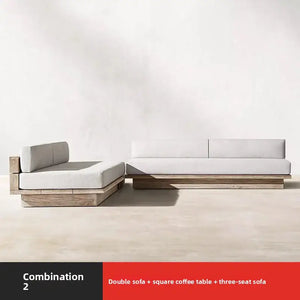 Teak outdoor sofa set showcasing waterproof cushion material and wood grain texture detail