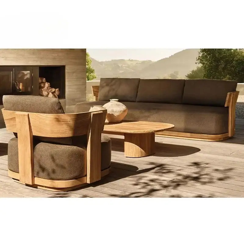 Teak wood outdoor sectional sofa showing dark gray modular cushions and contemporary design details