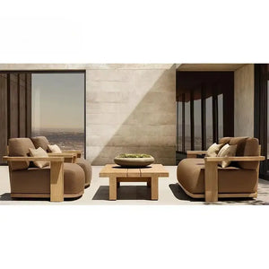 Teak wood sectional sofa showing dark gray cushions and modular construction detail from side angle