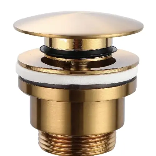 Brushed gold click-clack valve for modern bathroom fixtures closeup